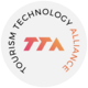 Rundes Logo der Tourism Technology Alliance in schwarz-rot-oranger Schrift